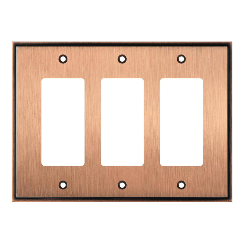 Copper triple gang switch plate on a white background