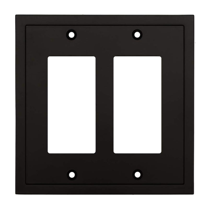 Black double-gang wall plate with white inserts on a white background