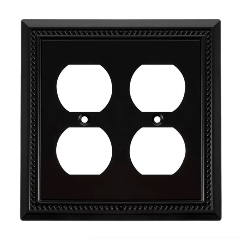 Black frame with white electrical outlet design on a white background