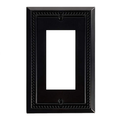 Black decorative wall plate on a white background