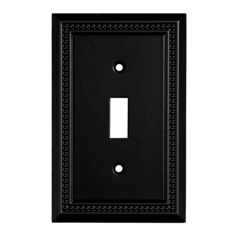 Black decorative light switch cover with a single toggle design on a white background