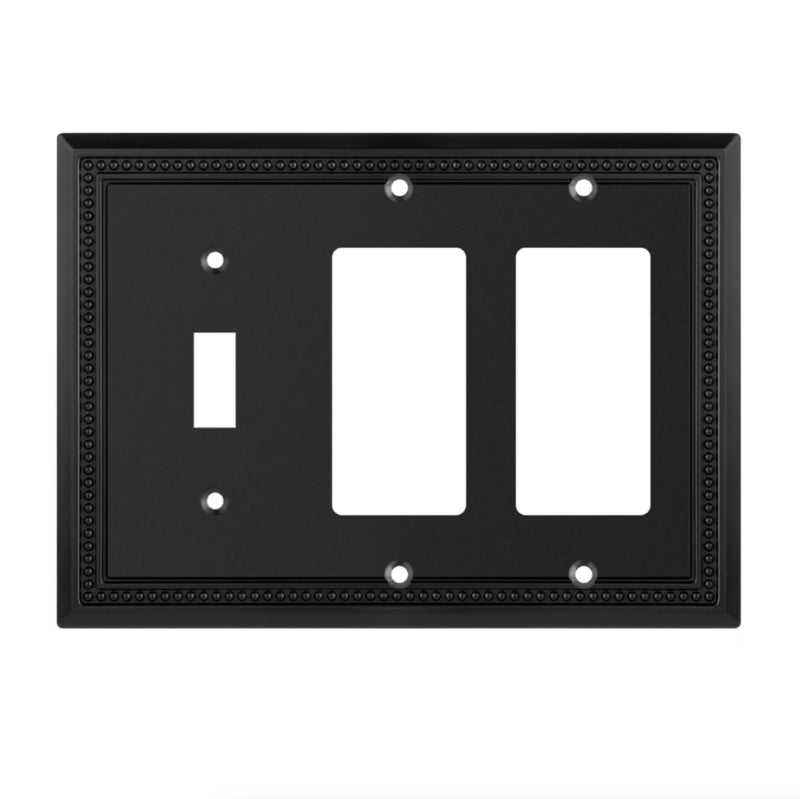 Black switch plate with three outlets on a white background