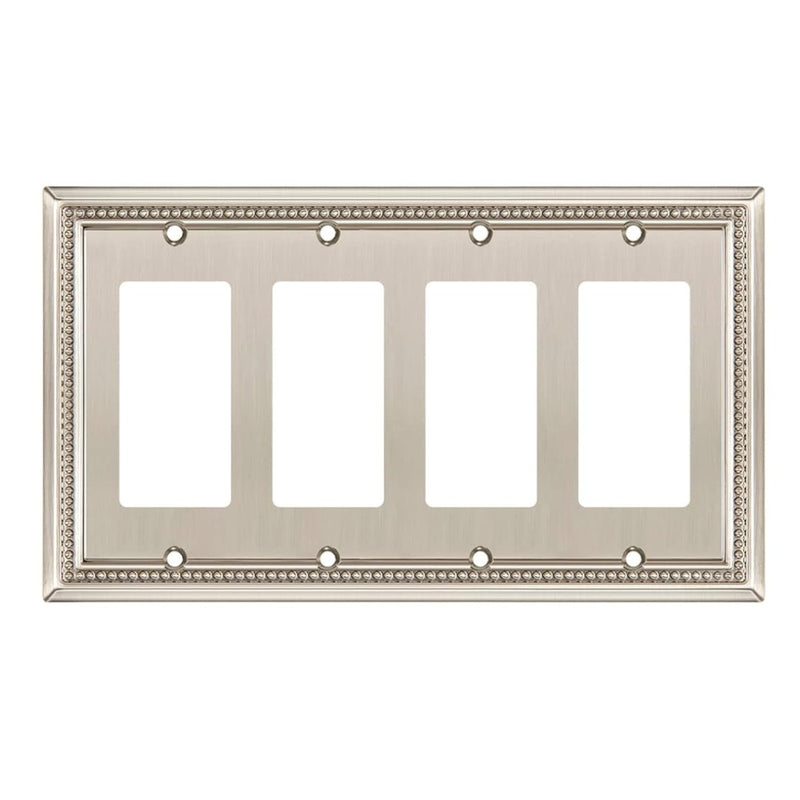 Decorative wall plate with four sockets on a white background