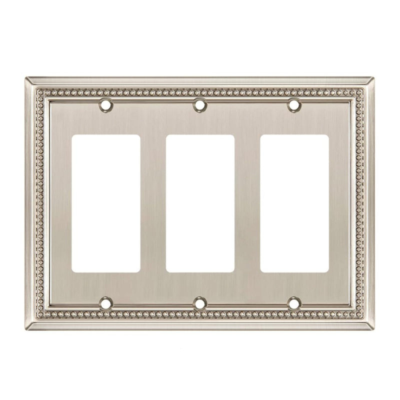 Decorative metal wall plate with three square openings on a white background