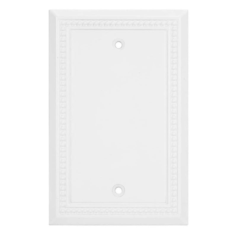 White wall plate with decorative border on a white background