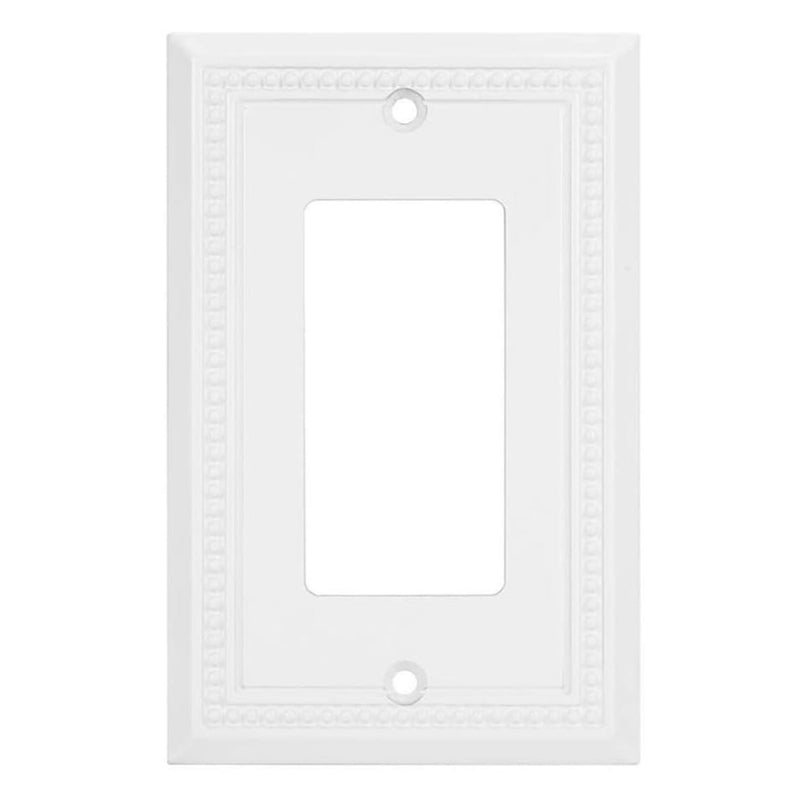 White wall plate with decorative border on a white background