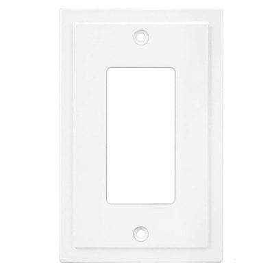 White wall plate with two screw holes on a white background