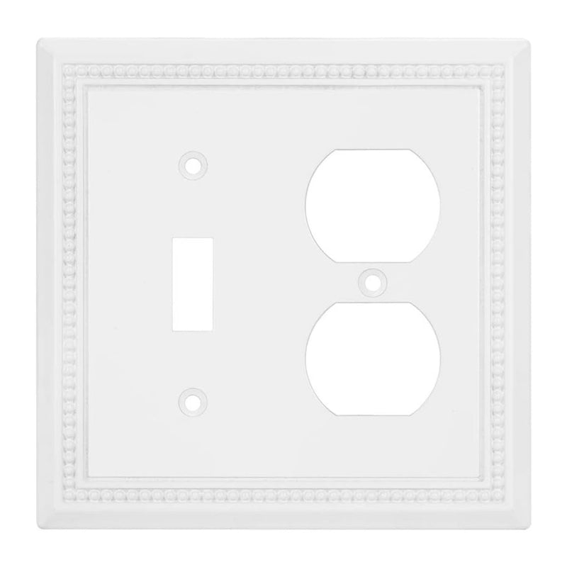 White wall plate with a switch and outlet design on a white background