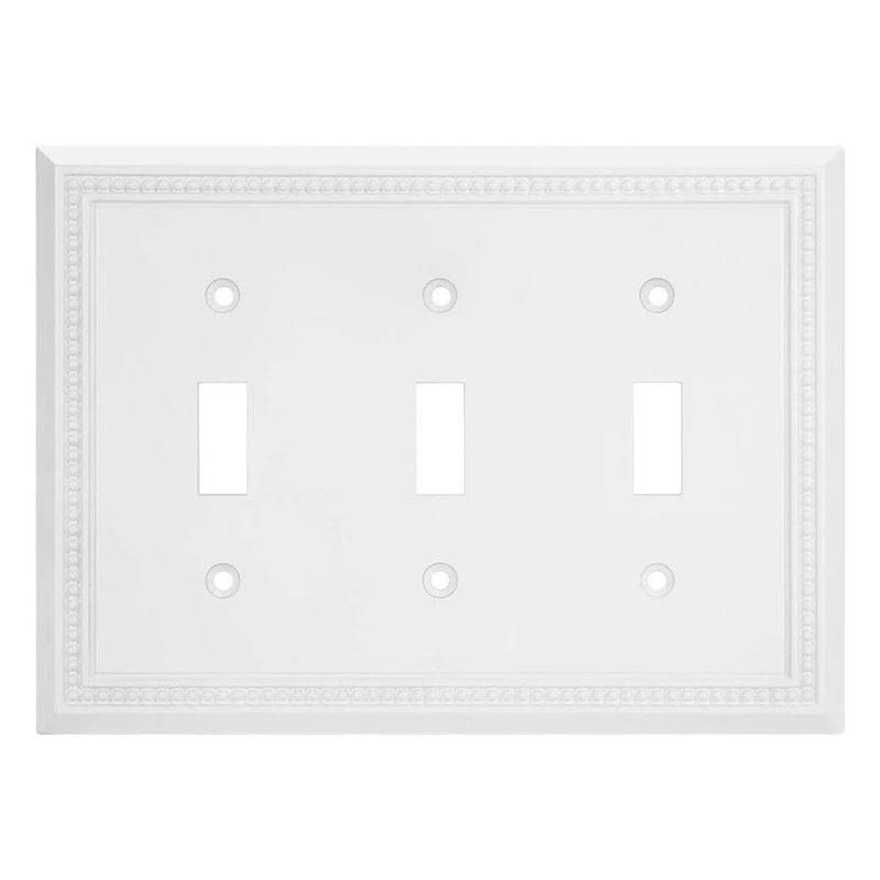 White triple toggle switch wall plate on a white background
