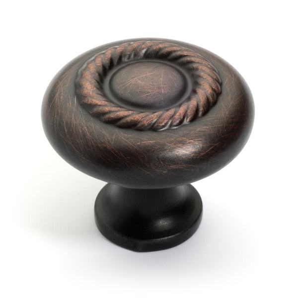 Rope design cabinet knob in oil rubbed bronze finish with one and a quarter inch diameter