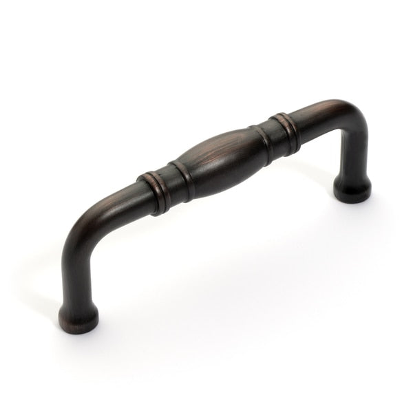 Barrel shape drawer pull in oil rubbed bronze finish with three inch hole spacing