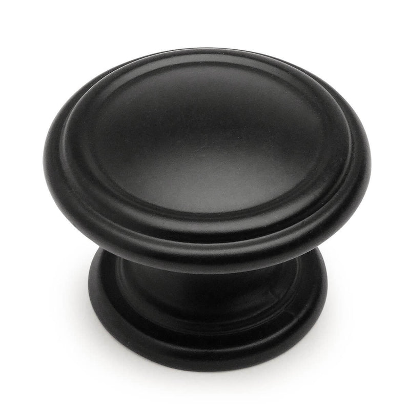 Round flat black cabinet drawer knob with two rings and one and five sixteenths inch diameter