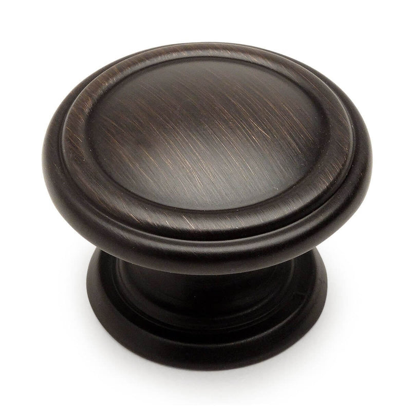 Oil rubbed bronze round cabinet drawer knob with two beveled rings along the edge of the face