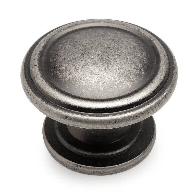 Weathered nickel finish cabinet drawer knob with beveled rings along the edge and one and five sixteenths inch diameter