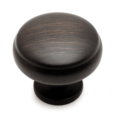 Oil rubbed bronze round cabinet drawer knob with subtle beveled lip on the top and one and three sixteenths inch diameter