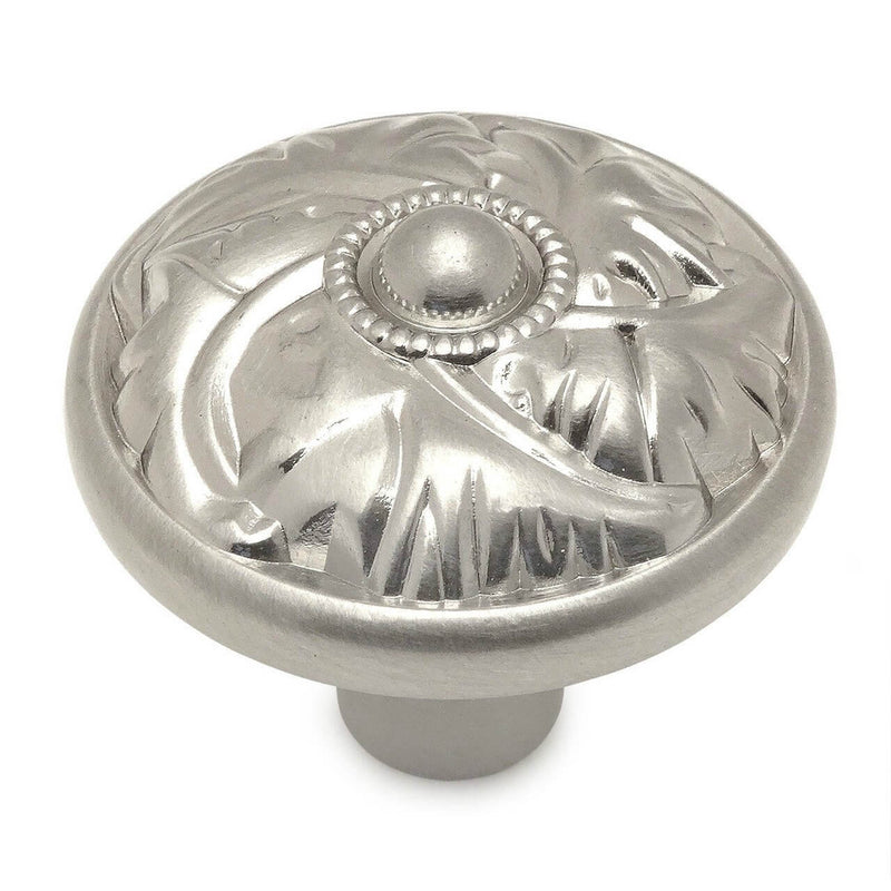 Satin nickel drawer knob with leaf etchings and one and a quarter inch diameter