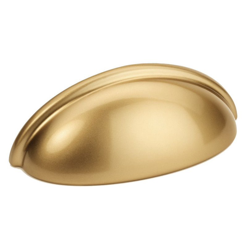 Cabinet cup pull in gold champagne finish with three inch hole spacing