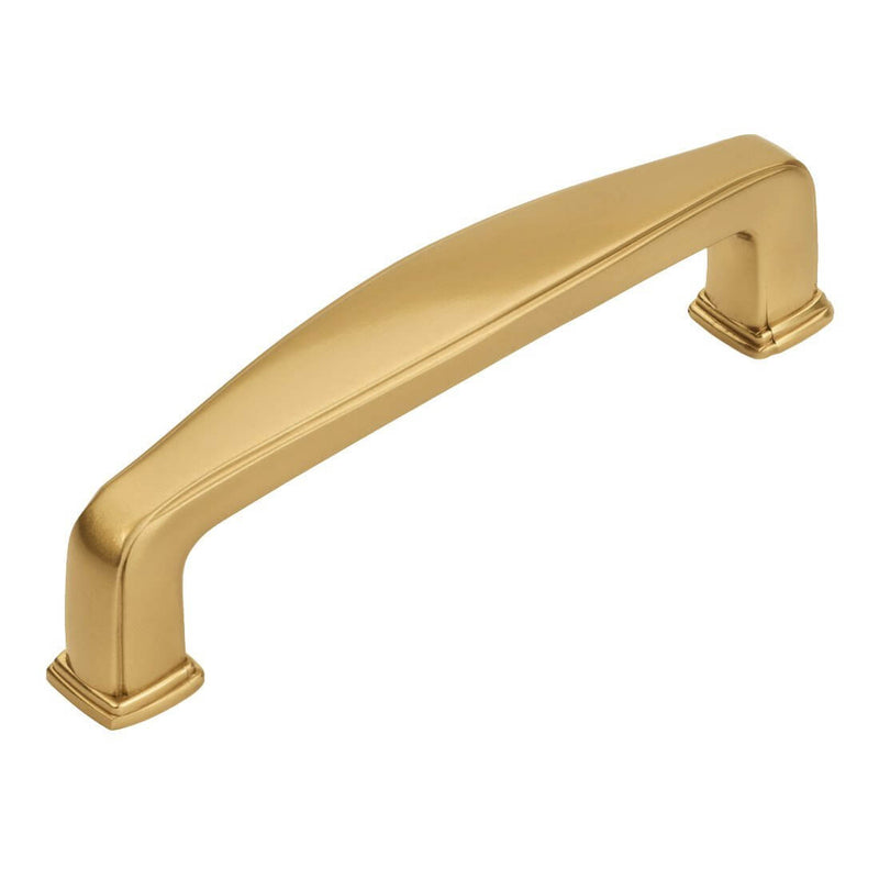 Cabinet drawer pull in gold champagne finish with a wide shape at the centre and three and a half inch hole spacing