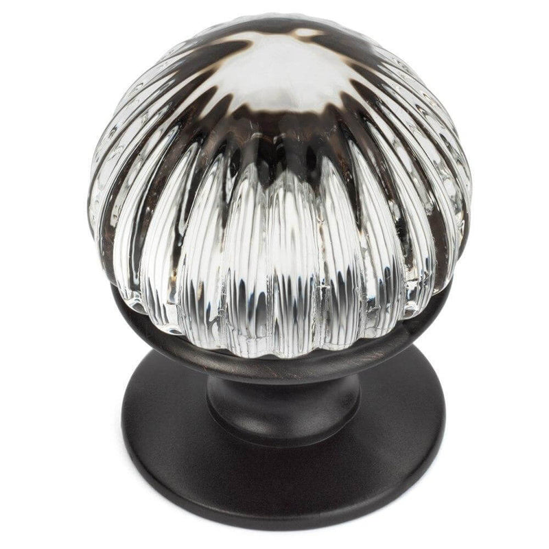 Clear glass cabinet knob with carving on all side of the glass in oil rubbed bronze