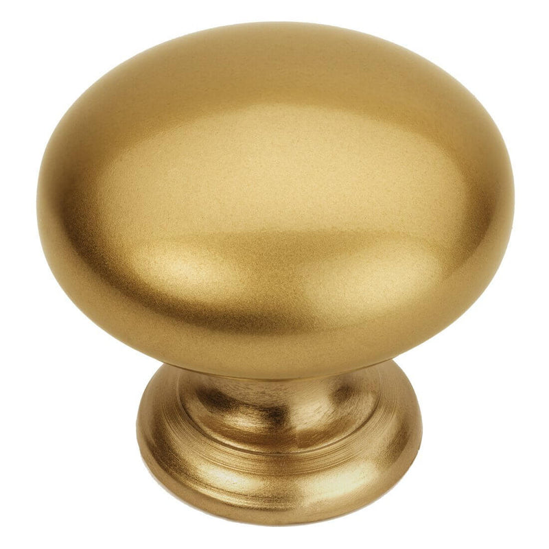 Gold champagne drawer knob with simple design and one and a quarter inch diameter