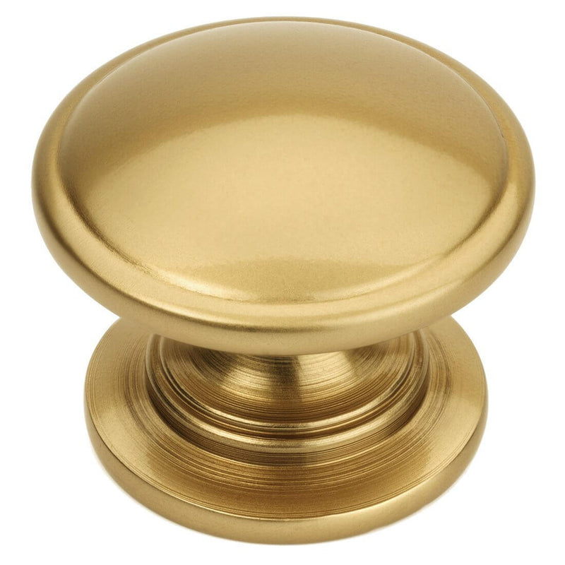Gold champagne drawer knob with slightly raised centre and solid wide base