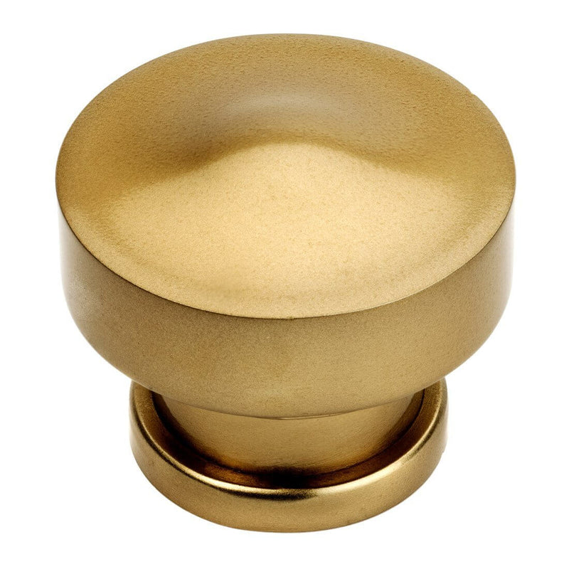 Round contemporary drawer knob in gold champagne finish with one and a quarter inch diameter