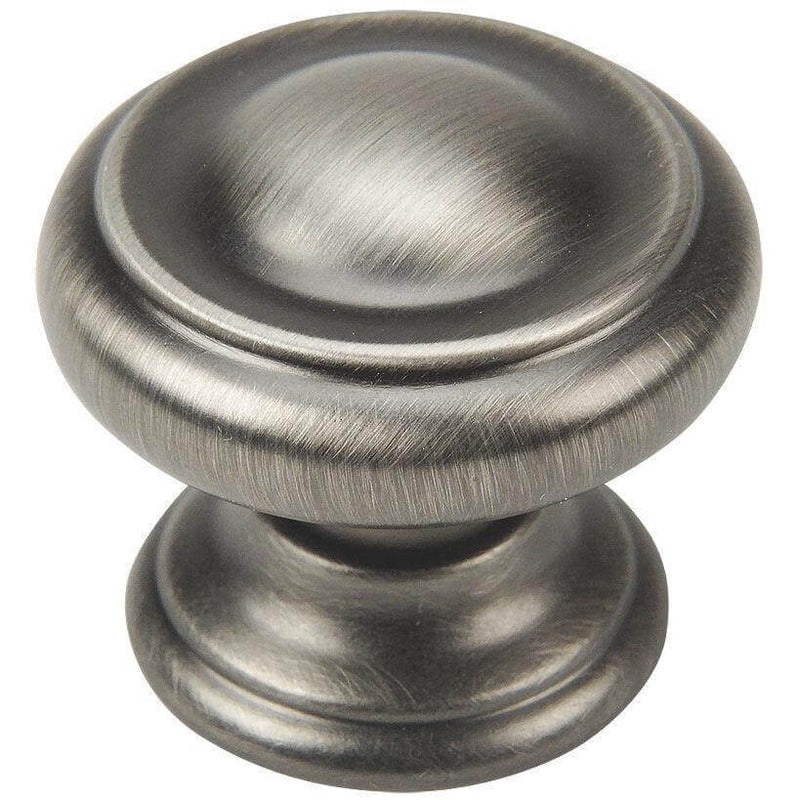 Antique silver cabinet knob with a slightly raised ring on the face and wide round base