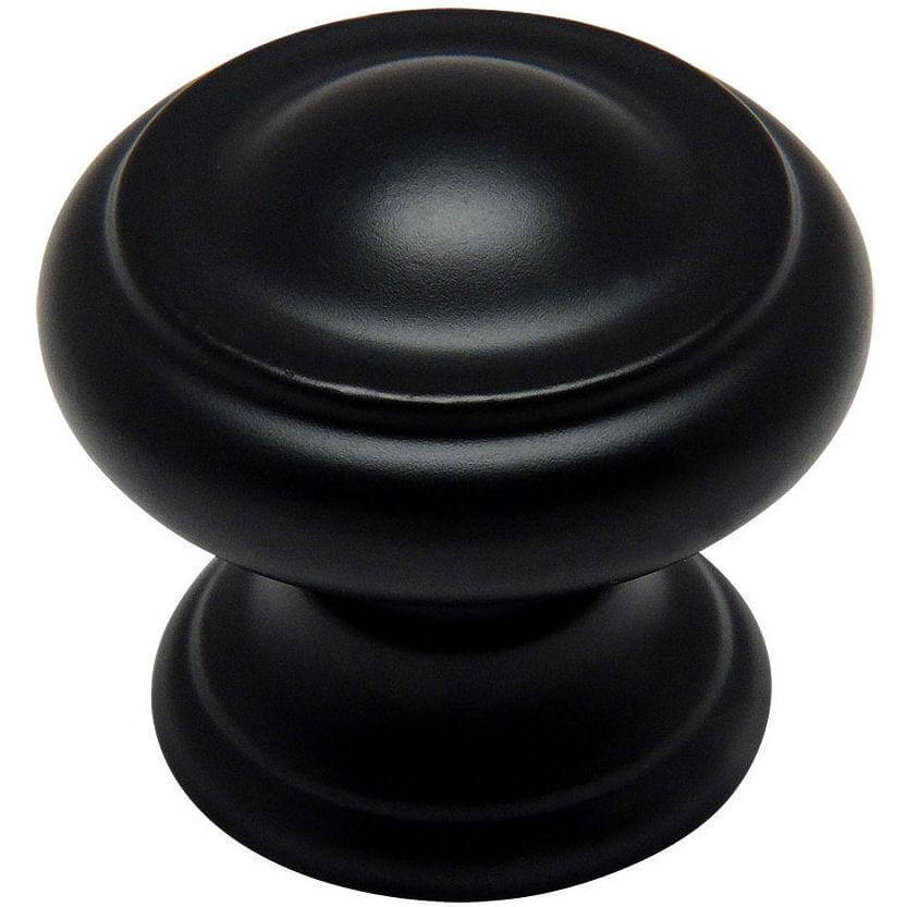 Round cabinet knob in flat black finish with slightly raised ring and one and three sixteenths diameter