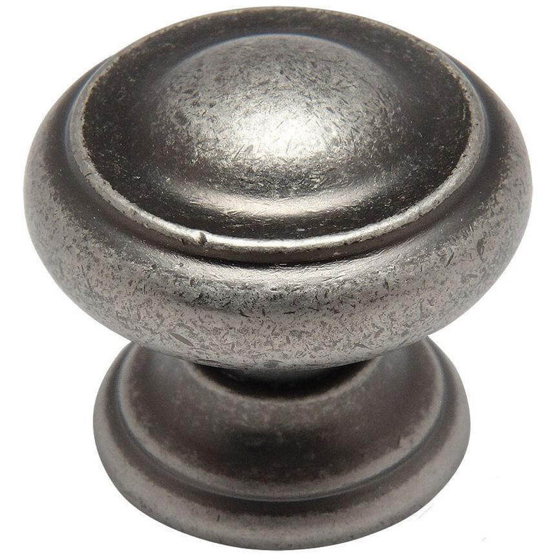 Weathered nickel cabinet drawer knob with raised ring on the edge and one and three sixteenths inch diameter