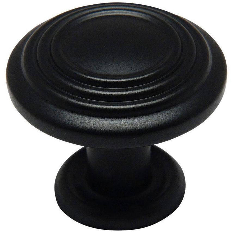 Drawer knob in flat black finish with three raised rings on the face