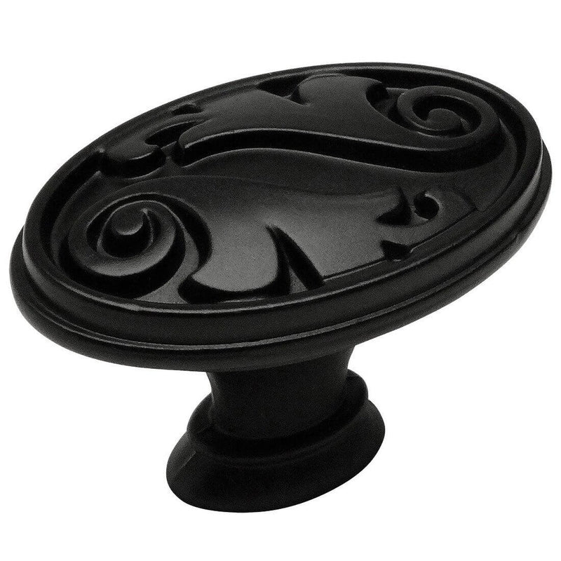 Floral engraving on the face of flat black drawer knob