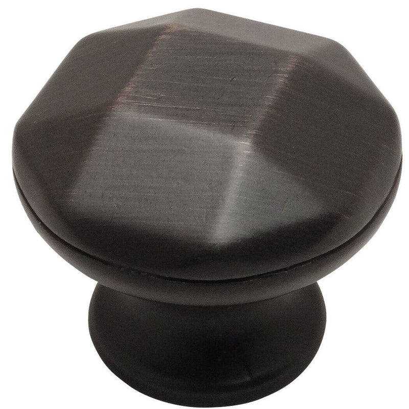 Oil rubbed bronze cabinet knob with structured texture on the face