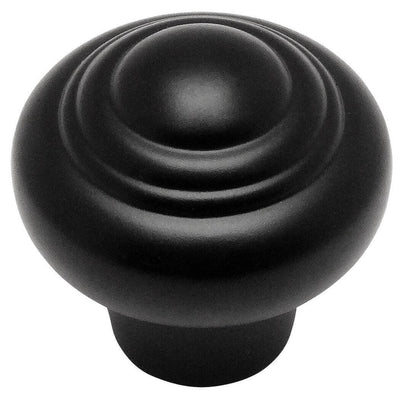 Round cabinet drawer knob with raised rings design and fifteen sixteenths inch diameter