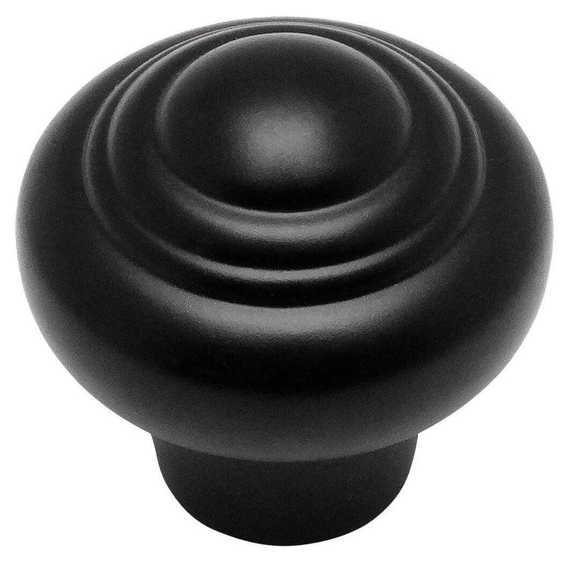 Round cabinet drawer knob with raised rings design and fifteen sixteenths inch diameter