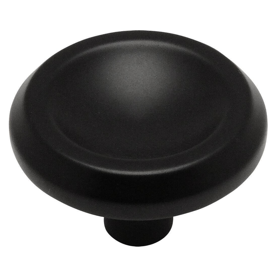 Thicker edges cabinet knob in flat black finish with concave centre and one and an eighth inch diameter