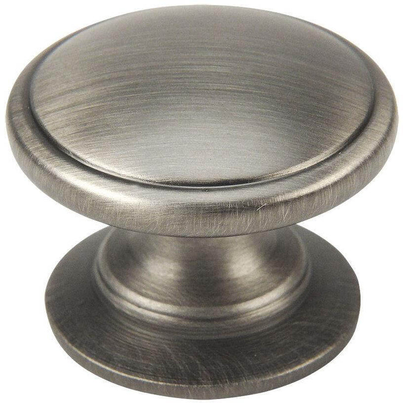 Round drawer knob in antique silver finish with slightly raised centre