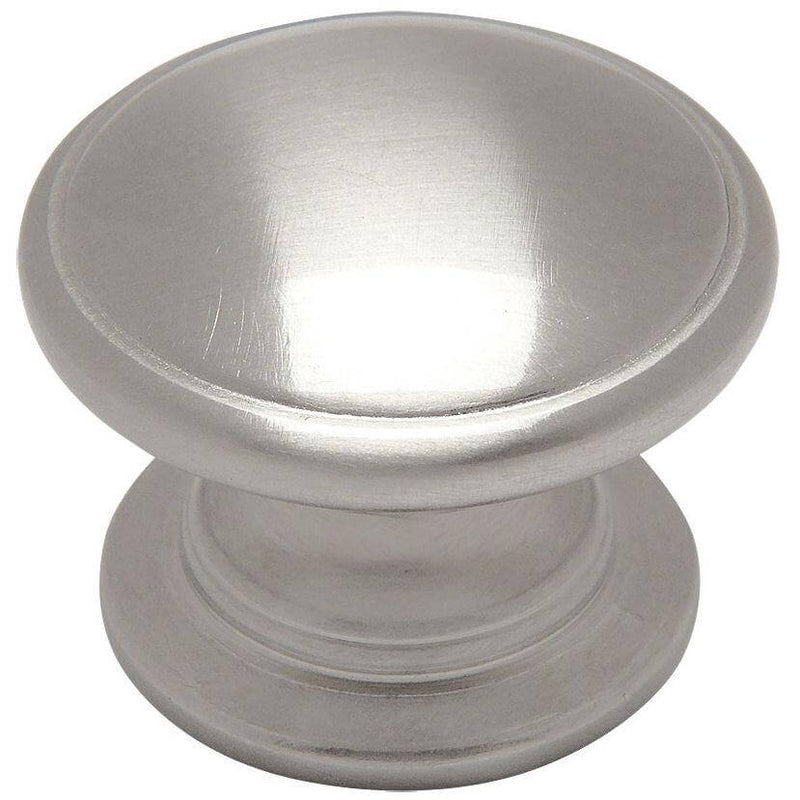 Round cabinet knob in satin nickel finish with slightly raised centre and solid base