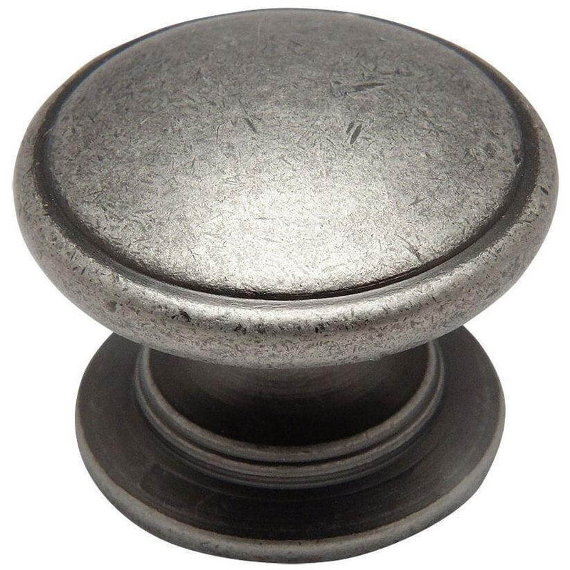 Round drawer knob in weathered nickel finish with slightly raised centre