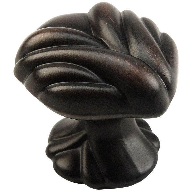 Oil rubbed bronze cabinet knob with decorative texture and one and three eighths inch length