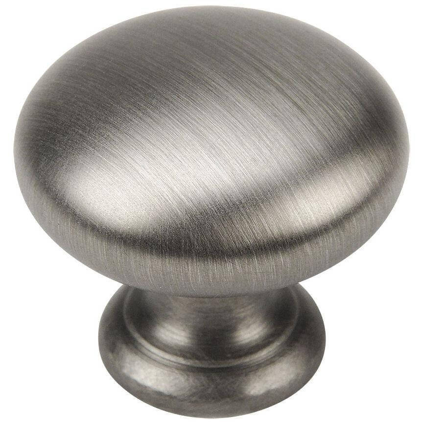 Basic round cabinet knob in antique silver finish with solid base and one and a quarter inch diameter