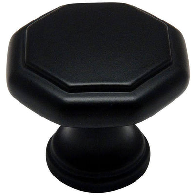 Flat black cabinet drawer knob with octagonal shape and one and a quarter inch diameter