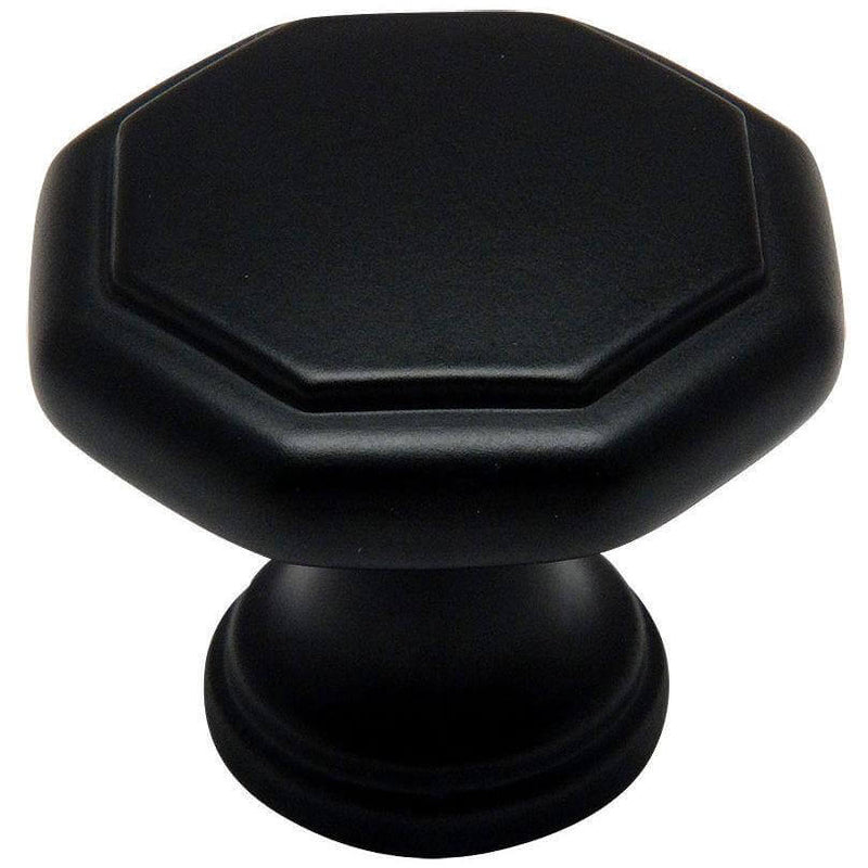 Flat black cabinet drawer knob with octagonal shape and one and a quarter inch diameter