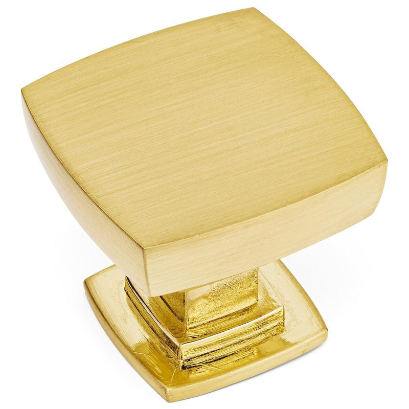 Cabinet drawer knob in brushed brass finish with convex square design