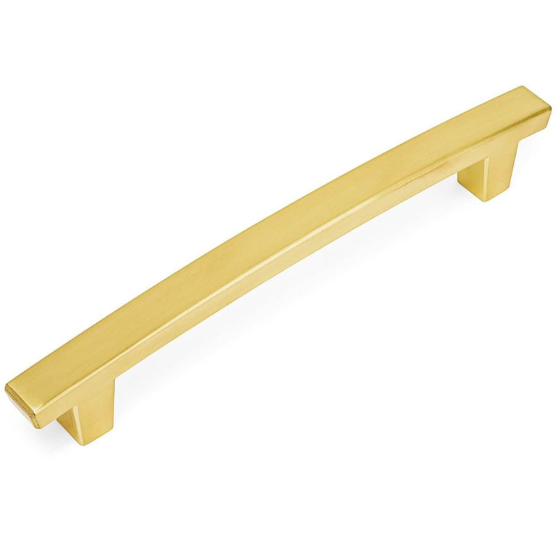 Subtle arched cabinet pull in brushed brass finish with five inch hole spacing