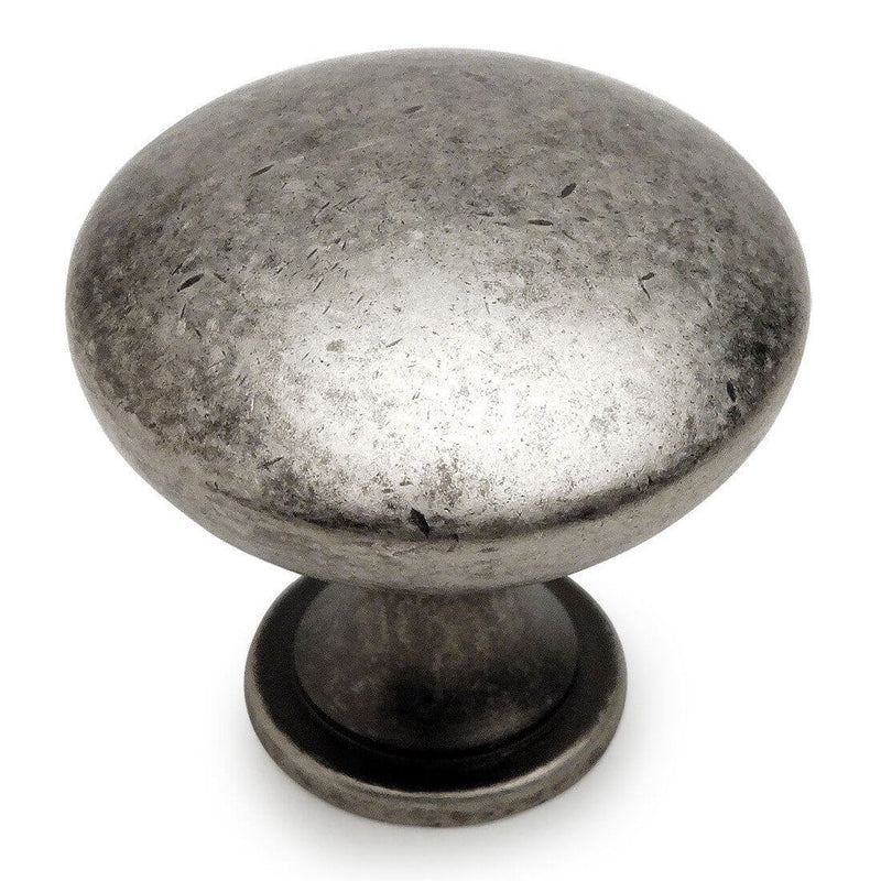 Cabinet knob in weathered nickel finish with one and three sixteenths inch diameter