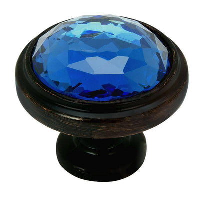 Round cabinet knob in oil rubbed bronze finish with round glass at the centre