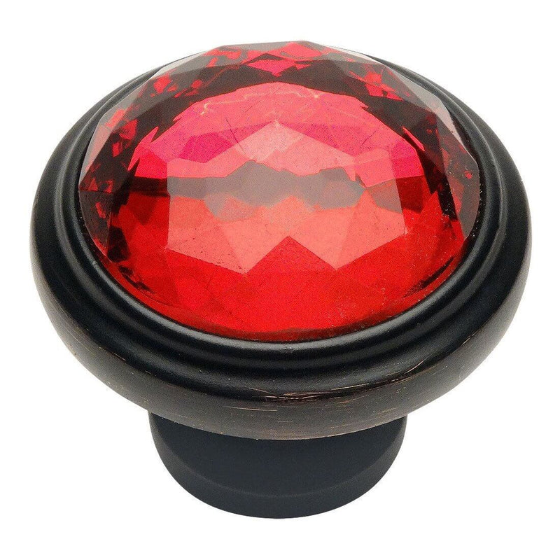Drawer knob in oil rubbed bronze finish with red glass crystal look at the centre and one and a quarter inch diameter