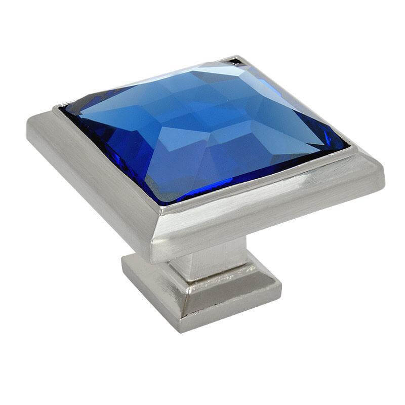 Square satin nickel cabinet knob with blue glass crystal look and one and a quarter inch length
