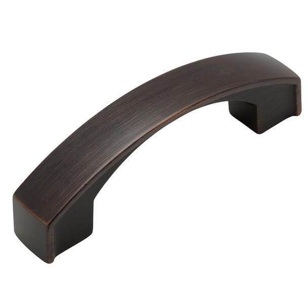 Wide rectangular plat design cabinet pull  in oil rubbed bronze finish with arch and three inch hole spacing