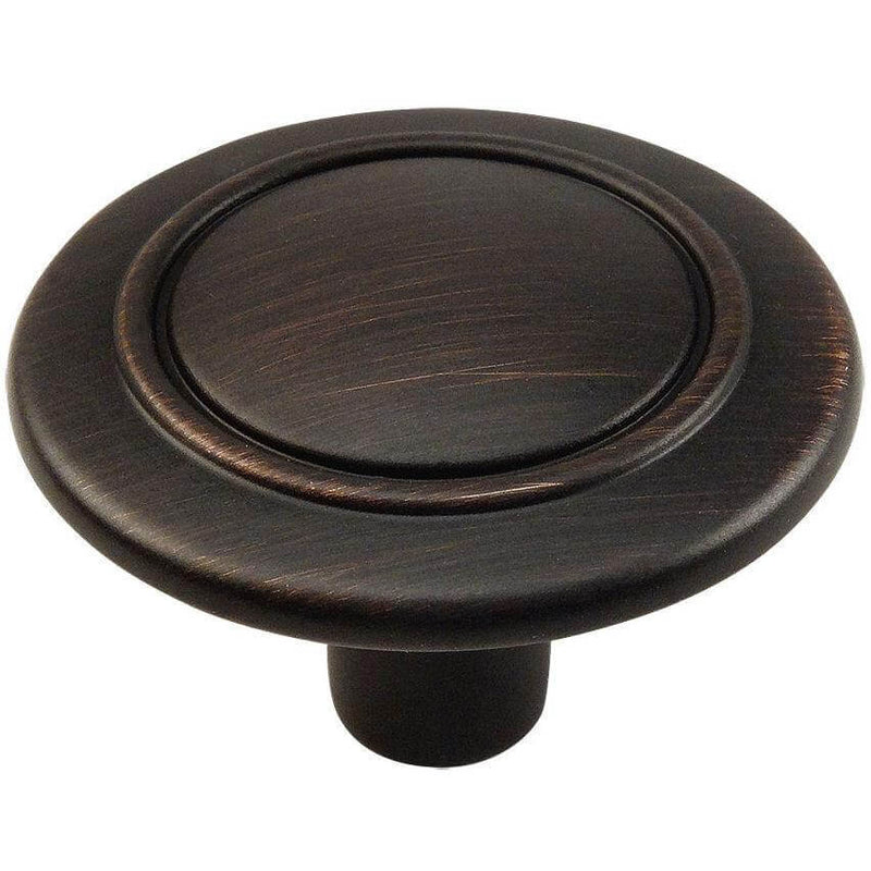 Round cabinet knob in oil rubbed bronze finish with a ring at the centre
